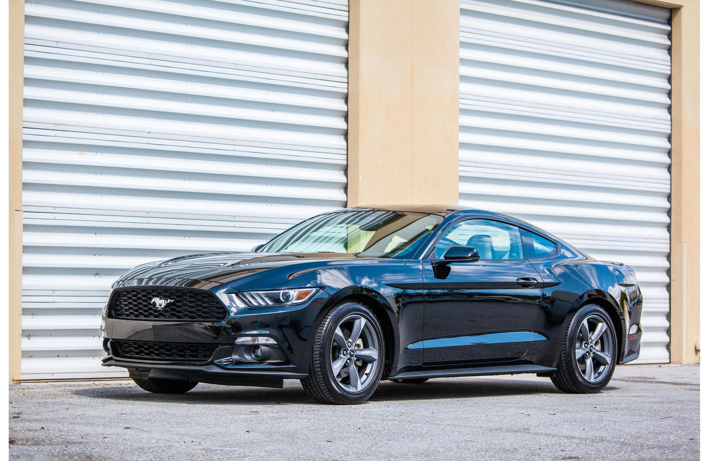 JL Audio SB-F-MUSCPE/12TW3 Stealthbox® Custom-fit fiberglass enclosure with 12" TW3-D4 subwoofer — fits 2015-23 Ford Mustang coupe only