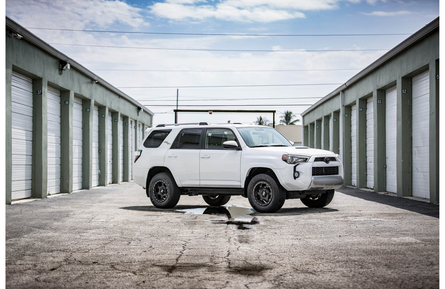 JL Audio SB-T-4RNRG5/10TW3 Stealthbox® Custom-fit fiberglass enclosure with 10" 10TW3-D4 subwoofer — fits 2010-13 Toyota 4Runner